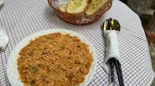 Traditional Albanian Fergese made with peppers, tomatoes, and local cheese