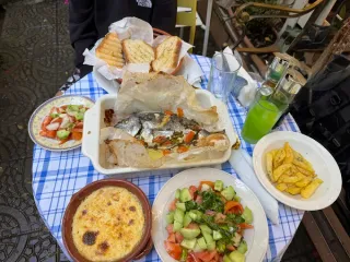 Tave Peshku and Tave Kosi - traditional Albanian baked fish and lamb dishes